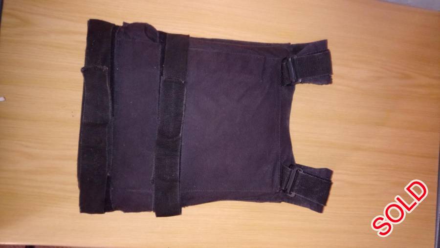 Bullet resistant vest, Bullet resistant vest. In Fair condition with Kevlar inner. No plates on back and front. Will stop pistol calibers