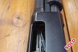 Pump action shotgun, R 5,000.00