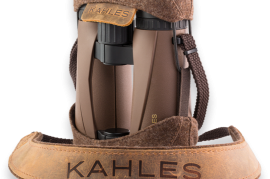 Kahles Helia 10x42, Kahles Helia 10x42
The Kahles Helia 10x42 binoculars with brilliant optics, natural earthy colouring and high-innovative accessories are made especially for the passionate hunter. The natural, earthy colour and the lightweight, ergonomic and balanced open-bridge design, make the Kahles Helia 10x42 binoculars ideal for inconspicuous use and wildlife watching. The wide field of view, practical magnification range and the high quality manufactured noiseless accessories, which were developed by hunters for hunters, are especially designed and built for smart and universal use. The latest lens technology of the Kahles Helia 10x42 binoculars enables natural-bright images with sharp detail view at day and twilight. The robust and waterproof casing of the Kahles Helia 10x42 binoculars, made of lightweight high tech components, together with nitrogen-filling, provides 100% protection from fogging and dirt. The Kahles Helia 10x42 binoculars are convenient and brilliant - from daybreak till twilight. High class binoculars at a decent price.

Features
Brilliant image quality from daylight till twilight.
Lightweight and ergonomic with ideal balanced open-bridge design.
Natural, earthy colouring ideal for inconspicuous wearing and watching.
Robust, anti-fog coating and 100% waterproof.
Innovative accessories of high-quality noiseless natural materials from manufactory Waldkauz, consisting of handmade leather-wool felt sling and with unique binoculars-protection-combination of brown alpine Loden materials.

SPECS:-
Magnification:
10
Objective lens diameter:
42 mm
Ocular and Objective Lens Coating:
Oilphobic
Field of view:
114 m/1000m
Field of view:
6.5°
Field of view apparent:
54°
Exit pupil mm:
4.2 mm
Eye relief:
20 mm
Diopter compensation:
+/-4 dpt
Waterproof:
1 m
Light transmission %:
86.5 %
Twilight factor:
20.49 (ISO 14132-1)
Near focus:
2.1 m
Height:
150 mm
Width:
127 mm
Weight:
770 g
Color:
Brown
Warranty:
11 Years