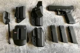 Glock 17 Gen 4, Glock 17 Gen 4 in excellent condition (fired under 1000 rounds). Accessories:

- 2Kg connector
- 3% Engineering Worx fiber optic sights
- CKCS RH IWB holster
- CKCS RH Sports Cut Paddle Holster
- CKCS Trigger Guard Holstet
- CKCS IWB single magazine holder
- Fobus OWB double magazine carrier
- 3 x 17 round Glock magazines
- Glock carry case with backstrap extensions