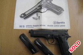 Beretta Mod 92 S, Spotless Beretta Mod 92 Semi - Automatic pistol. Still in original box with original owners manual. Very few shots fired. Leather holster included. A collectors item.