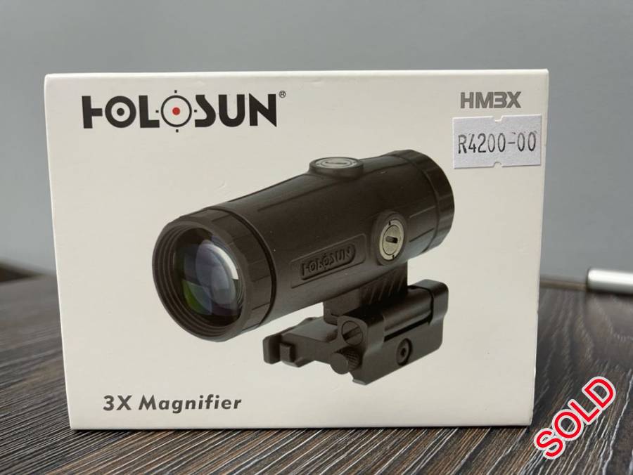 Holosun HM3X, The HM3X is An Aluminum bodied 3X magnifier that includes a quick release, ambidextrous, flip-to-side mount with Absolute and Lower 1/3 Co-witness mounting solutions. Additional features include 2.75” of eye relief, IP67 certified water resistance, with windage and elevation adjustment for precision zeroing.