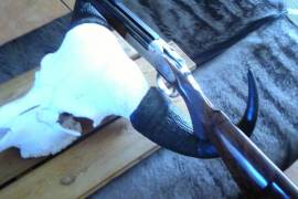 Mr, I have a 470 NE rifle made by Ralph Badenhorst in a like new condition for sale. Rifle comes with case, 43 cartridge cases, 56 solid Hornady bullets, 26 soft Hornady bullets and Redding die set. The rifle is engraved with a loin, elephant and buffalo. Stock is turkish walnut.