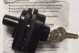 Shot Lock Keyed Gun Trigger Lock, Extra Security for your firearm. The two halves press together on either side of the trigger guard and prevent access to or pulling/firing of the trigger itself.