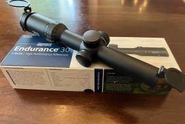 Hawke Endurance 30  1 - 4 x 24 Rifle Scope, An as new Hawke Endurance 30 1 -4 x 24 L4A Dot rifle scope with red dot illumination, mounted but never used. 30mm tube. Lens protection caps & tools incl.