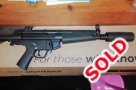 POF MP5 HMC 9mmP Unfired Dealer Stocked R40 000, POF MP5 HMC Retractable Stock, Chambered 9MMP Unfired, Dealer stocked with 2 x Magazines and cleaning kit, ASE UTRA Suppressor, Has Original H&K Stock, Original H&K Trigger Group,H&K Bolt, Serious Buyers only R38000, 00 without Supressor R48 000,00 with Suppressor ,Dealer to Dealer transfers can be arranged 