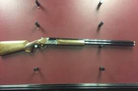 Bettinsoli T16 Sporting Shotgun, Bettinsoli T16 Sporting in 12Ga , 30' barrels and multichokes. Good quality walnut stock, 5 extended chokes in gun case with spares kit. Good value for money Italian shotgun. Left hand version also available at R 35800.00.