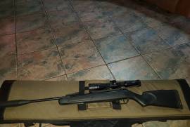 BSA  AIR RIFLE, Bsa air rifle, as new barely been used. It has a Hawke scope and a silencer with a padded bag and some bullets.