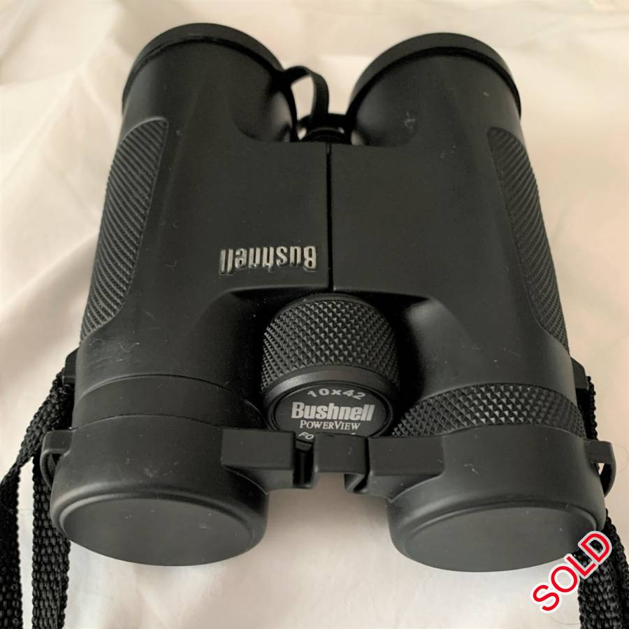 Bushnell 10x42 Powerview Binocular, as new. , High-magnification, full-size viewing ideal for long-range observation. Features fully multi-coated optics and multiple layers of anti-reflective coating on all air-to-glass surfaces deliver bright, high-contrast images.