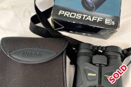 Nikon Prostaff 3s 10x42 binoculars in box as new., The Nikon Prostaff 3S 10x42 Binoculars feature Silver-Alloy coated prisms for bright imagery full of contrast. A 63º apparent angle of view improves ease of use and limits disorientation usually cause by large magnification optics. The Prostaff 3S is built with a durable rubber coated providing a non-slip grip even in wet conditions. To further enhance durability, the Prostaff 3S is weather sealed to protect it against water leakage and fog buildup.