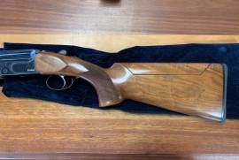 Zoli Kronos 32" Adj stock Sporter, The Zoli Kronos is the Italian manufacturer's best kept secret! Removable trigger group, rock solid lock up (similar to Perazzi) Adjustable stock and this model features regulated 32