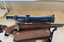 Burris Eliminator III, Scope has barely been used, looks like new, and everything works perfectly.
Still have everything it came with, perfect condition.