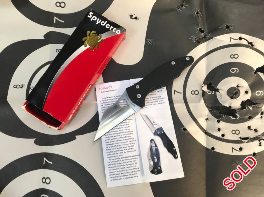 Spyderco Yojimbo 2, Spyderco Yojimbo 2 carried a few times but hardly cut anything ( opened a cardboard box ). Has a 4000 grit mirror polished edge. Comes with Box and papers 

price includes postnet to postnet 