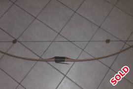 Woodlands long bow , Woodlands long bow made by heartwood bows in excellent condition.  Right hand 52# at 28 inch draw. Comes with bow sock , stringer , quiver and 3 arrows. On buyers account. Contact me on 0791835620. 