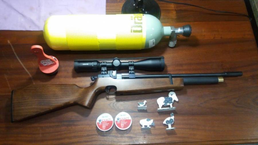 CZ 200 PCP, In perfect condition with HAWKE, 4-16 x 40 side paralax focus scope, 10 shot magazine, bottle, adapter, targets, etc.