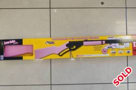 Pink daisy red ryder, Original daisy. Wood stock. Spring action. Includes pink glasses, bb's and targets. Year end special. While stocks last