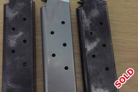 7 Round .45 ACP magazines, 3 Mags for sale,one is stainless-7 round