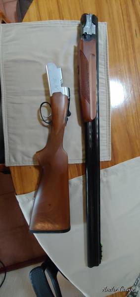 AVZAN 12 Gauge Over & Under, AVZAN 12 Guage over & under shotgun with selective trigger and front illumindated sight.  Shotgun fired about 80 rounds.  Shotgun in extremely good condition.