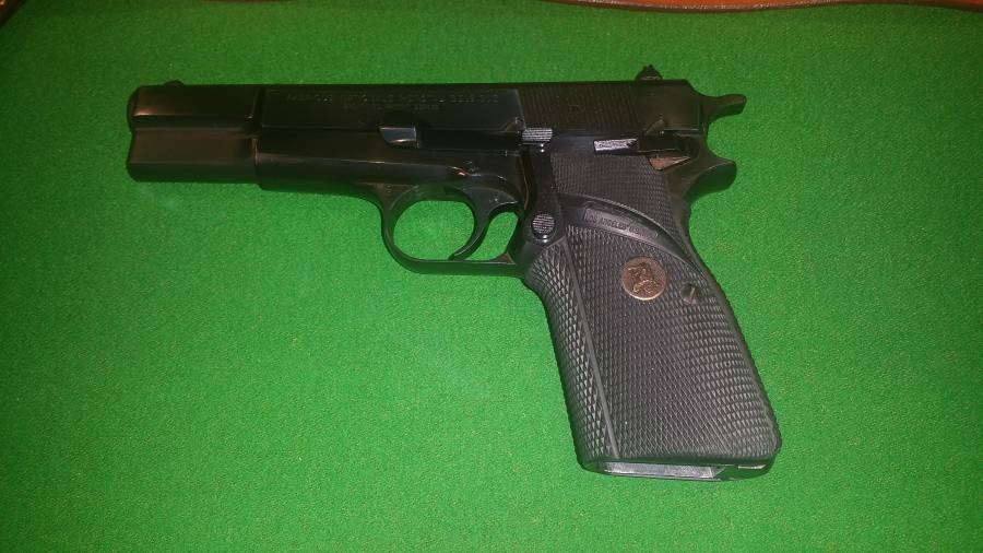 Browning Hi-Power, FN Browning Hi-Power 9mm Parabellum in excellent condition.

The magazine disconnect has been removed and the trigger, transfer bar, sear, hammer and feeding ramp have all been polished. A longer safety lever has been installed along with Pachmayr grips.