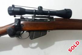 1942 long branch Lee Enfield, Rifle in pristine condition. Original and  matching serial numbers. Mount and