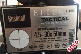Bushnell Elite Tactical XRS 4.5-30x50, Bushnell xrs  4.5-30x50 die scope is so goed soos nuut rede hoekom ek hom verkoop ek het my  geweer verkoop prys onderhandelbaar hulle kom vortex ringe m 0798885900