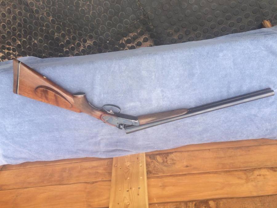 sidexside shotgun, good condition.less than 500 rounds through the barell.no pitting or fading