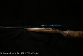 BENNIE LAUBSCHER .375H&H, THIS .375 H&H WAS CUSTOM BUILT BY BENNIE LAUBSCHER ON AN OBENDORF MAUSER ACTION. IT IS ENGRAVED AND COMES WITH A LEUPOLD 1,5-5 SCOPE. THIS RIFLE IS SIMPLY OUTSTANDING. 

EMAIL ME FOR MORE PICTURES 