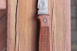 Vintage Okapi, Vintage made in Germany Okapi folder. Wood handle with square cut pattern. Wood is in a good condition. Blade worn as a vintage knife would be. Rare find.