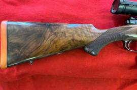 SPORTING RIFLE, ORIGINAL MAUSER A TYPE SPORTING RIFLE. 9.3 X 62 . NEW HIGH GRADE WALNUT STOCK BY FAAN DE VOS. KAHLES 3-9 POWER SCOPE. EXCELLENT CONDITION.
