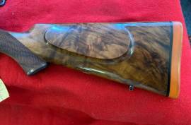 SPORTING RIFLE, ORIGINAL MAUSER A TYPE SPORTING RIFLE. 9.3 X 62 . NEW HIGH GRADE WALNUT STOCK BY FAAN DE VOS. KAHLES 3-9 POWER SCOPE. EXCELLENT CONDITION.