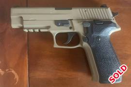 Sig Sauer P226 MK25 FDE, Excellent condition. I've shot less than 500 rounds through this FA. Bought brand new from Pretoria Arms (Dave Sheer Pretoria at the time) - the full size pistol is just too big for me to carry comfortably. Comes with and IWB and OWB Daniel's Holsters and 2 magazines. 

