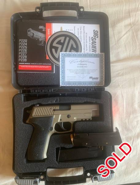 Sig Sauer P226 MK25 FDE, Excellent condition. I've shot less than 500 rounds through this FA. Bought brand new from Pretoria Arms (Dave Sheer Pretoria at the time) - the full size pistol is just too big for me to carry comfortably. Comes with and IWB and OWB Daniel's Holsters and 2 magazines. 

