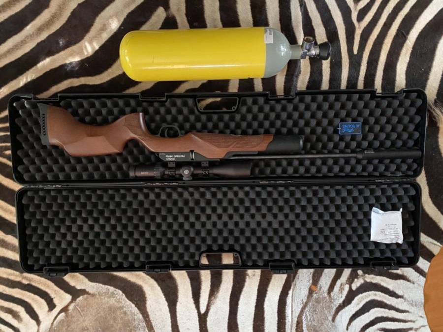 Walther PCP air gun, Walter Rotex RM8 wood 5.5mm fitted with weihrauth silencer and a Hawk scope 8shot magazine.
Dive cylinder and refill fittings. 
 