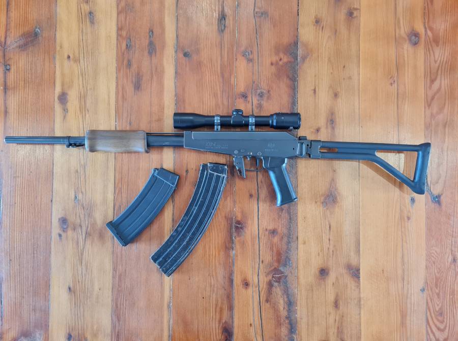 Vektor H5 223 Rifle, .223 Vektor H5 for sale with two magazines and the original Trijicon telescope.  It is a pump action with foldable stock