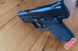 Smith&Wesson M&P Shield 9mm, 9mm shield with safety. Includes truglo sites and talon grips, will also include sniper hybrid holster. Done about 300 rounds and looks perfect. The ideal small carry 9mm. 
