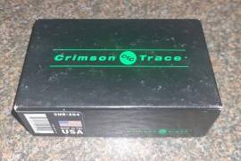 Crimson Trace CMR-204 Rail Master Pro WML, Crimson Trace CMR-204 Rail Master Pro Picatinny mounted green laser/light for firearm.

Last price was $389.99 before end of life (approx R7340 at today's exchange rate)

Light will be couriered only after EFT payment clear in account/cash received in hand.

Postnet counter to counter delivery included.

No chancers, no scammers.