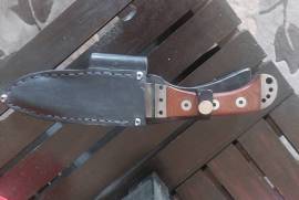 Hand made Knive, Good condition
Genuine leather pouch
maybe need some finer fishishing touches