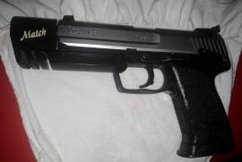 Mr Toto, H&K USP full size with original compensator and two mags
