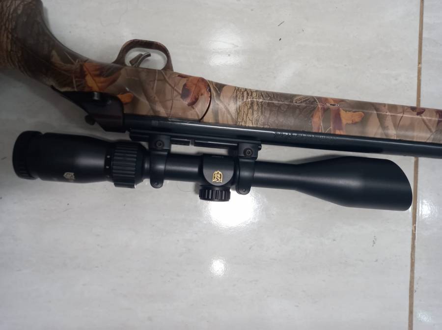 Thomson centre Impact. 50, Black powder rifle with Sterling night eater scope 1-9 x 40 plus few extras