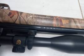 Thomson centre Impact. 50, Black powder rifle with Sterling night eater scope 1-9 x 40 plus few extras