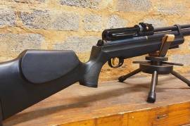 Hatsan AT44-10 PCP Air rifle, Hatsan AT44-10 PCP Air rifle in .22 (5.5mm) in an ambidextrous black synthetic stock with adjustable butt pad. Includes 2x magazines and fill probe. In excellent condition. R6000.
 