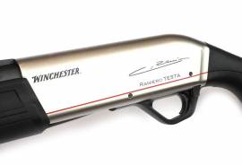 WINCHESTER SX4 RANIERO TESTA-WORLD RECORD EDITION, Winchester shooter Raniero Testa broke new physical barriers in 2017, shooting 13 clays in 1.6 seconds with his SX4™. To celebrate this world record, we have created a special edition, magnum-chambered SX4™ with an 10-shell tube magazine. Its nickel-finished receiver and tube magazine strike a wonderful contrast with the composite stock and fore-end. This magnificent gun bears the name of Raniero Testa and includes five Invector-Plus™ chokes.