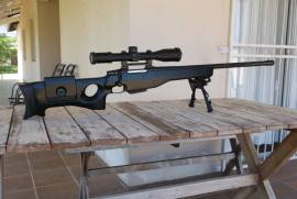 Military Sniper Rifle for sale.., BARREL AGE 200 ROUNDS MAX. SUPERB QUALITY RIFLE. A4 PAGE GROUPS @ 1000 METERS. KAHLES 3-12X50 MILITARY MILDOT SCOPE. 2 X 10 SHOT MAGAZINES, HARRIS BIPOD AND CASE.